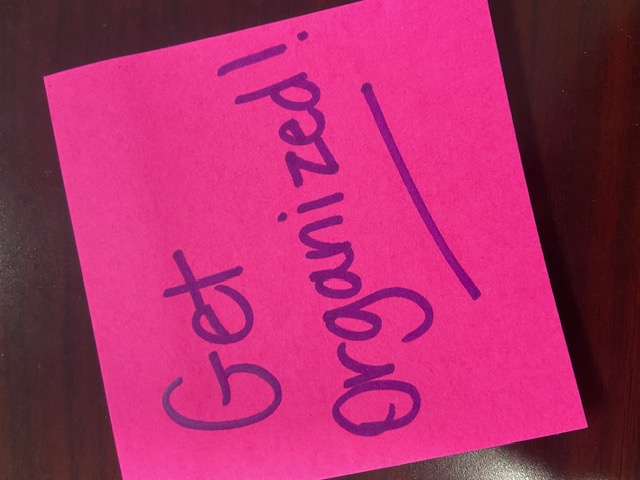 Sticky note saying "get organized"